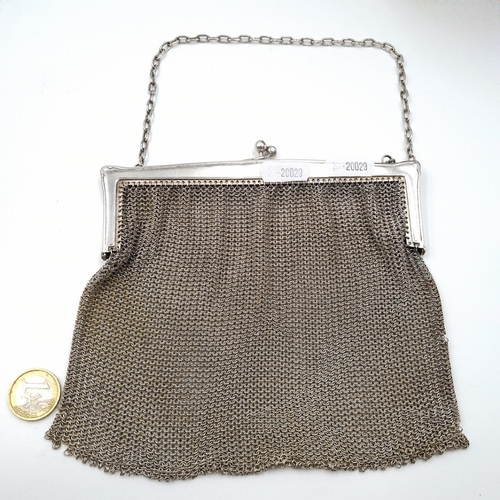 573 - A very attractive white metal mesh evening bag with initials M.J.C. Dimensions: Frame: L - 16 cms. B... 