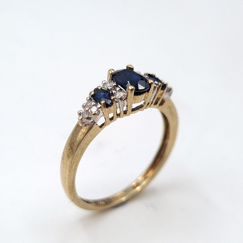 584 - Super Star Lot : A nice example of a diamond and sapphire stone ring set in nine carat gold. Ring si... 