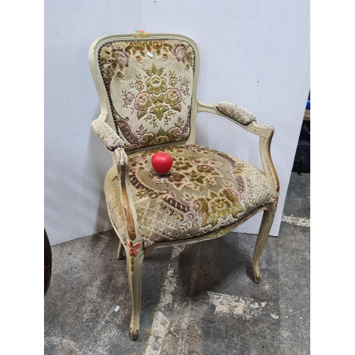 640 - Star Lot : A fabulous French style occasional chair upholstered in a floral pattern. With beaded det... 