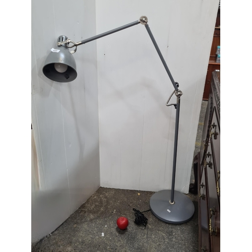 649 - Star Lot : A super Ikea industrial style articulated reading lamp in a grey metal finish.