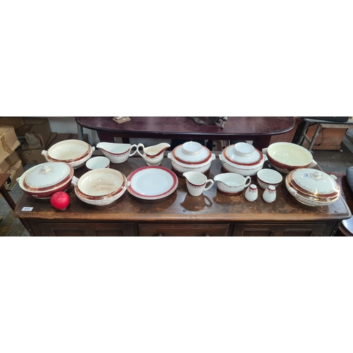 676 - A 17 piece Wedgwood set including lidded tureens, sauce boat, salt and pepper shakers, and milk jug.