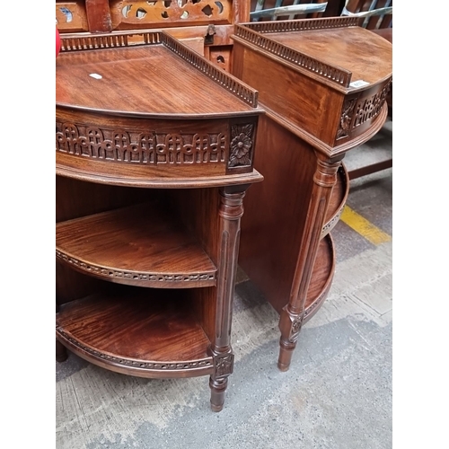 417 - Star Lot : A fabulous Pair of Edwardian mahogany demilune side tables, ornately carved with floral m... 