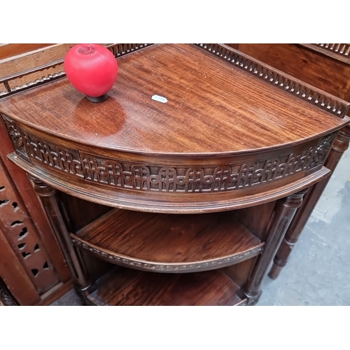 417 - Star Lot : A fabulous Pair of Edwardian mahogany demilune side tables, ornately carved with floral m... 