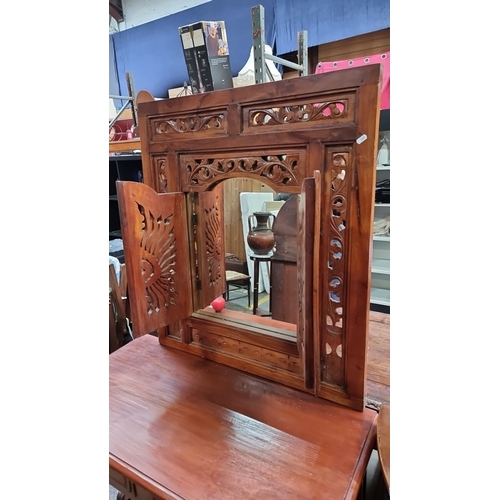 434 - Star Lot : A very handsome red mahogany  vanity or console table with detailed carved mirror behind ... 