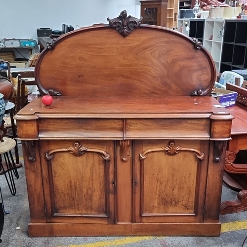 451 - Star lot : A Classic Victorian mahogany sideboard with ornate carved detailing, featuring two drawer... 