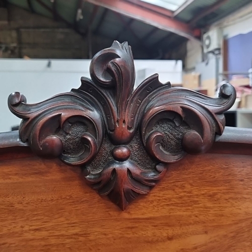 451 - Star lot : A Classic Victorian mahogany sideboard with ornate carved detailing, featuring two drawer... 