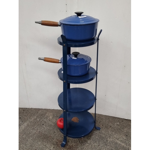 Star Lot Set of two blue Le Creuset enamel cast iron saucepans with