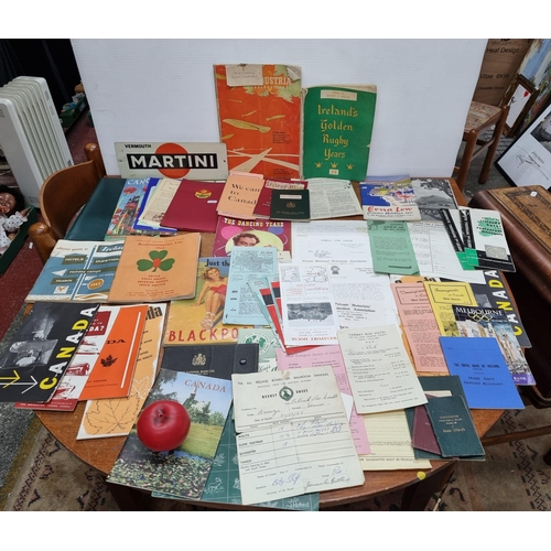 720 - A box containing a fabulous selection of vintage ephemera including an original Martini advertising ... 