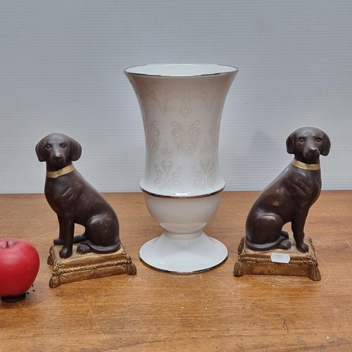 736 - Three items including a tall Lenox vase as well as a pair of Labrador figures.