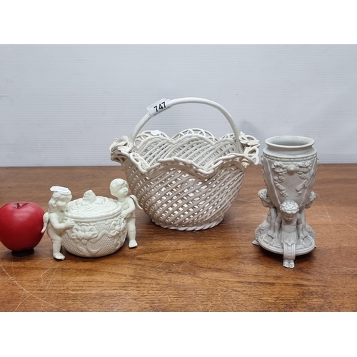 747 - Three items including a large ceramic woven basket a stone wear vase and a lidded dish.