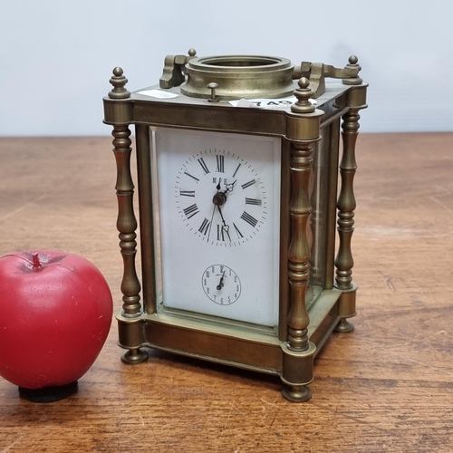 749 - Star lot: An early 20th century hour repeating  brass carriage clock with open glass display showcas... 