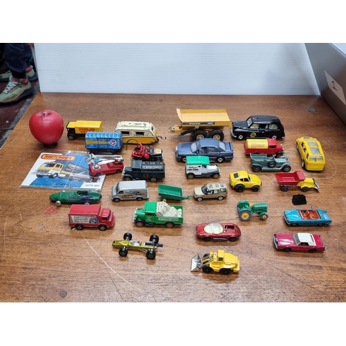 773 - A box of collectable die cast model cars. Includes a Corgi Austin London Taxi cab, a Corgi Morris Tr... 