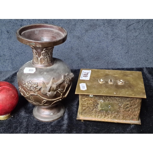 789 - An antique hammered brass box 