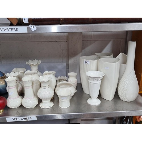 782 - A large collection of Belleek Irish pottery, all vases in various shapes and sizes. One Wedgwood exa... 