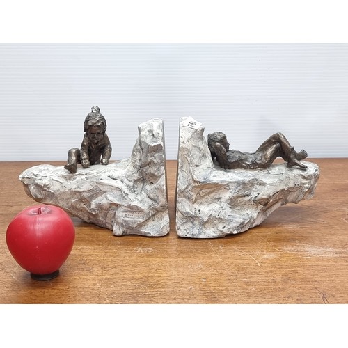 764 - A fantastic pair of bookends by artist Grace Critchley. The artist has captured the playful whimsy o... 