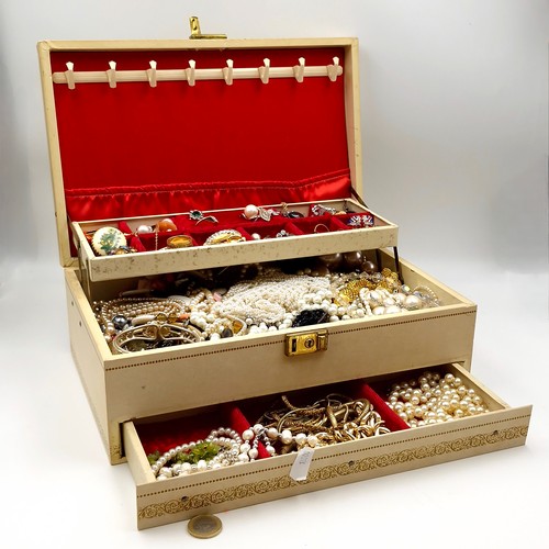 999 - A very nice example of a large full ladies jewellery box containing a large assortment of unchecked ... 