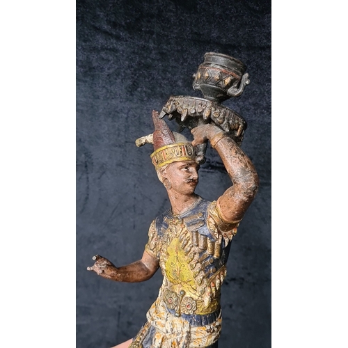 815 - Pair of vintage painted metal sculptures depict traditional dancers, featuring intricate detailing w... 