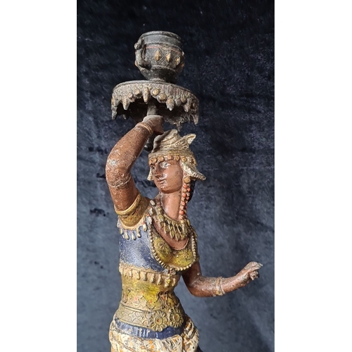 815 - Pair of vintage painted metal sculptures depict traditional dancers, featuring intricate detailing w... 