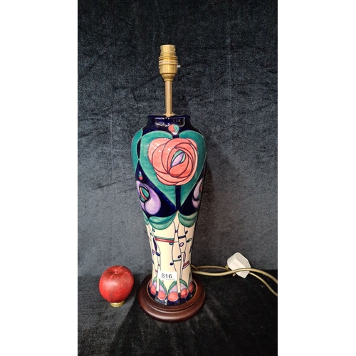 816 - Star lot : A stunning very large  Moorcroft ceramic table lamp features a vibrant floral Art Nouveau... 