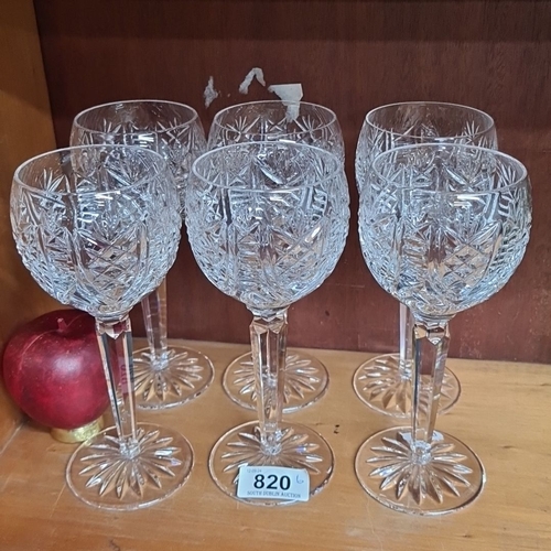 820 - Set of six Waterford crystal wine glasses, featuring intricate cut patterns and a hallmark on the ba... 