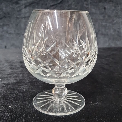 827 - Set of five crystal cut glass brandy snifters with a diamond and fan pattern design.