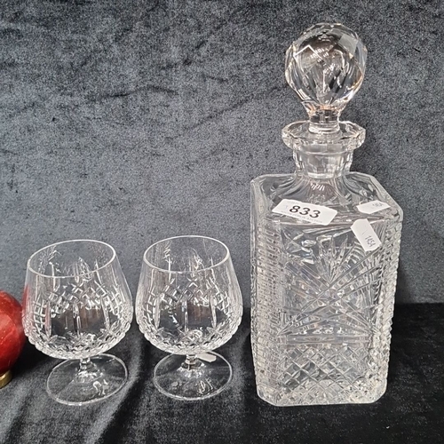 833 - Crystal decanter set with stopper and two matching glasses, marked 