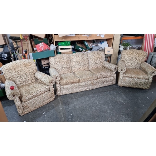 892 - Star lot : Vintage upholstered art deco living room suite, comprising three-seater sofa and two armc... 