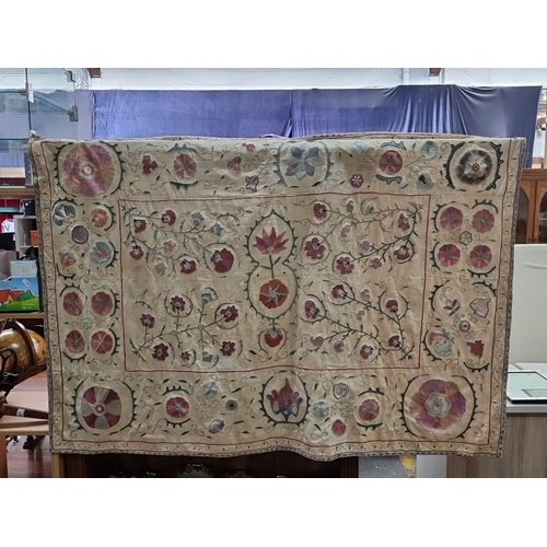 893 - Super Star Lot: A remarkable antique Bokhara Silk Suzani Tapestry. Handwoven by Ubzec women from the... 