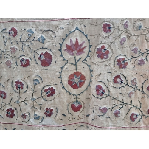 893 - Super Star Lot: A remarkable antique Bokhara Silk Suzani Tapestry. Handwoven by Ubzec women from the... 