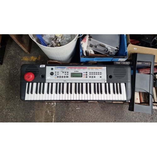 894 - Yamaha YPT-260 Portable Keyboard features a 61-key layout, multiple instrument voices, song, and sty... 