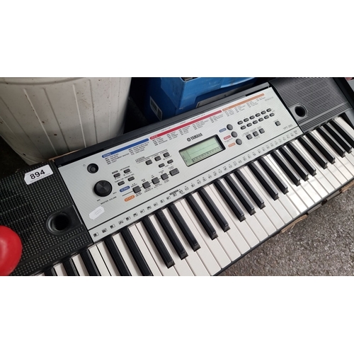 894 - Yamaha YPT-260 Portable Keyboard features a 61-key layout, multiple instrument voices, song, and sty... 