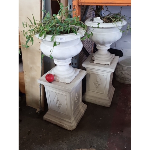 896 - Star lot : Pair of white-painted concrete garden urns on matching pedestals with diamond relief moti... 