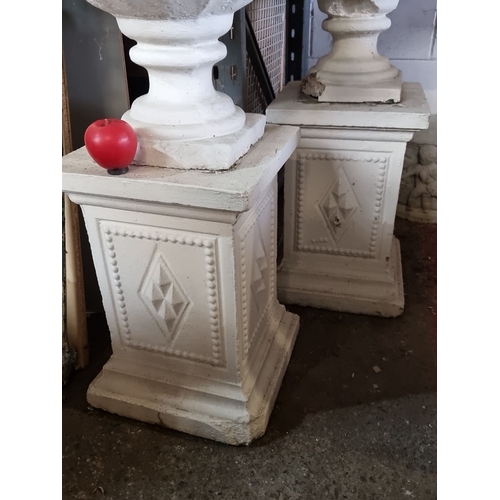 896 - Star lot : Pair of white-painted concrete garden urns on matching pedestals with diamond relief moti... 