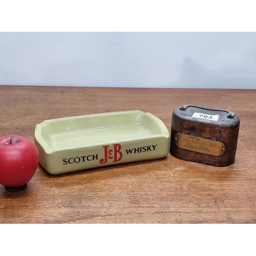 763 - Two items including a vintage Weighed ceramic J&B Scotch whiskey ash tray and a Dublin Savings Bank ... 