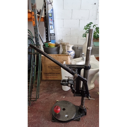 906 - Vintage industrial drill press with cast iron base and lever mechanism, marked 1981.