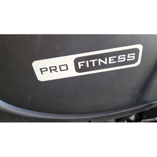 913 - Pro Fitness exercise bike. Sturdy build with adjustable resistance and ergonomic handlebars. Brand: ... 