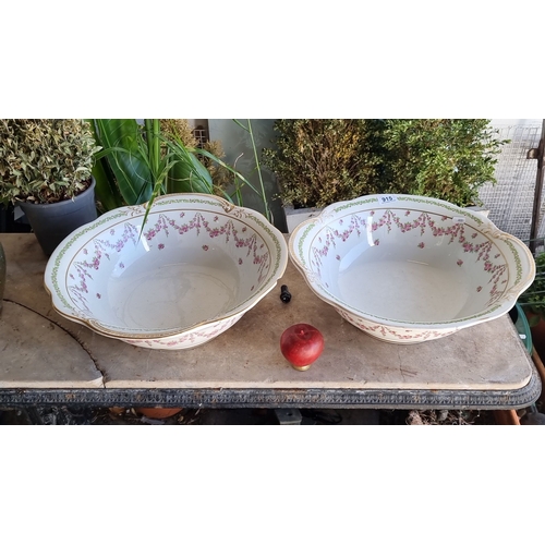 915 - Pair of vintage porcelain bowls with floral and gold trim design.