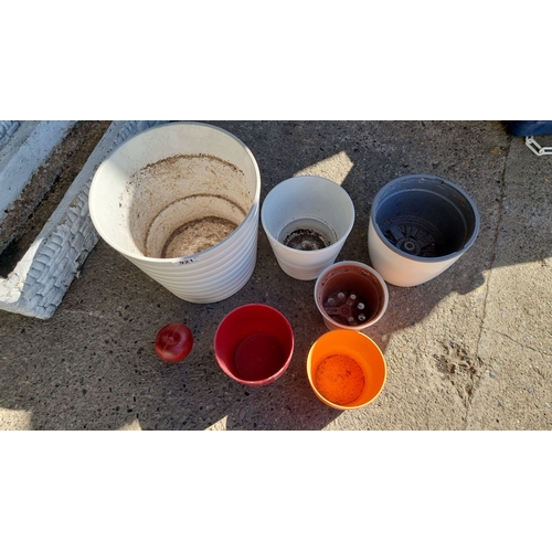 921 - Mixed Lot of Seven Various Plant Pots. Includes multiple colors and sizes, predominantly round and p... 