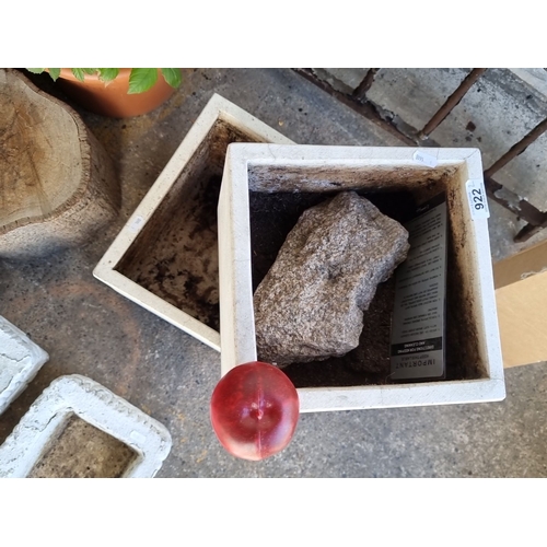 922 - Pair of square white stone planters with natural texture.