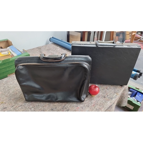 960 - Pair of vintage black leather briefcases, including one Fokcroft by Antler case, both featuring stur... 