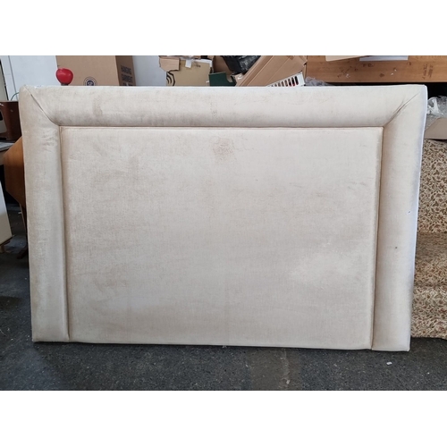 977 - Upholstered headboard with a neutral fabric front and black backing, featuring a simple and elegant ... 