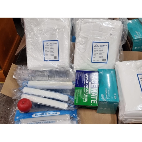 1089 - A box of sealed mixed PPE gear including disposable face masks, twenty isolation gowns, face shields... 