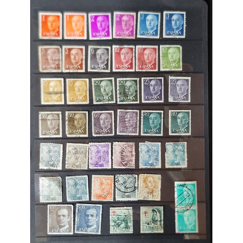 1102 - A wonderful folder containing a collection of stamps from around the World including Kenya, Spain, I... 