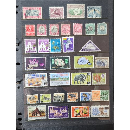 1102 - A wonderful folder containing a collection of stamps from around the World including Kenya, Spain, I... 