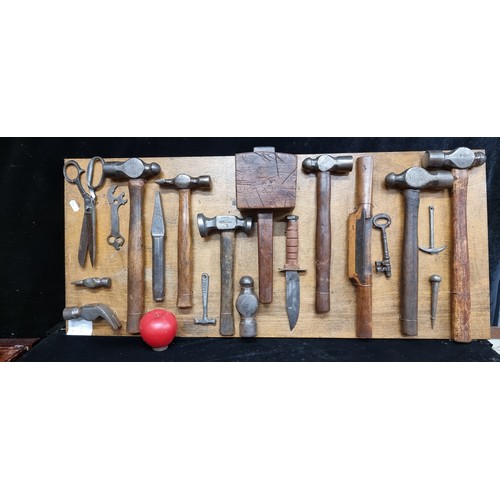 234 - A fabulous collection of vintage and antique tools including hammers, knifes, spoke shave, and other... 