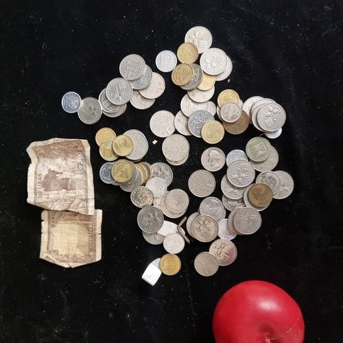 983 - A bag containing a large collection of coinage.