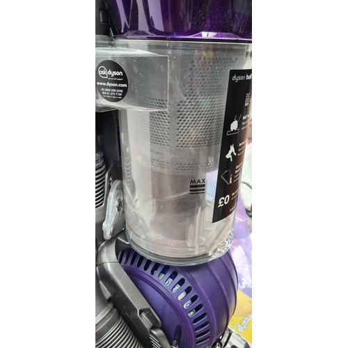 354 - An as new boxed, Dyson ball DC25 animal upright vacuum cleaner / hoover. With all attachments. RRP €... 