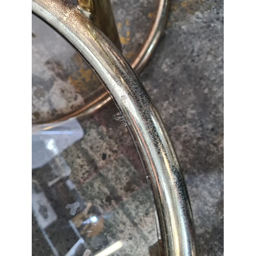 642 - Super Star Lot : A vintage 1960s Italian  signature brass plated oval Sofa table. Features revolving... 