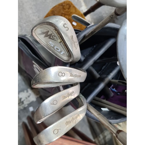 643 - A set of golf clubs including MacGregor irons and wedges, driver, 3 and 5 wood. Along with a Spaldin... 