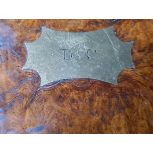 733 - A gorgeous Victorian walnut writing slope featuring brass hardware and cartouche